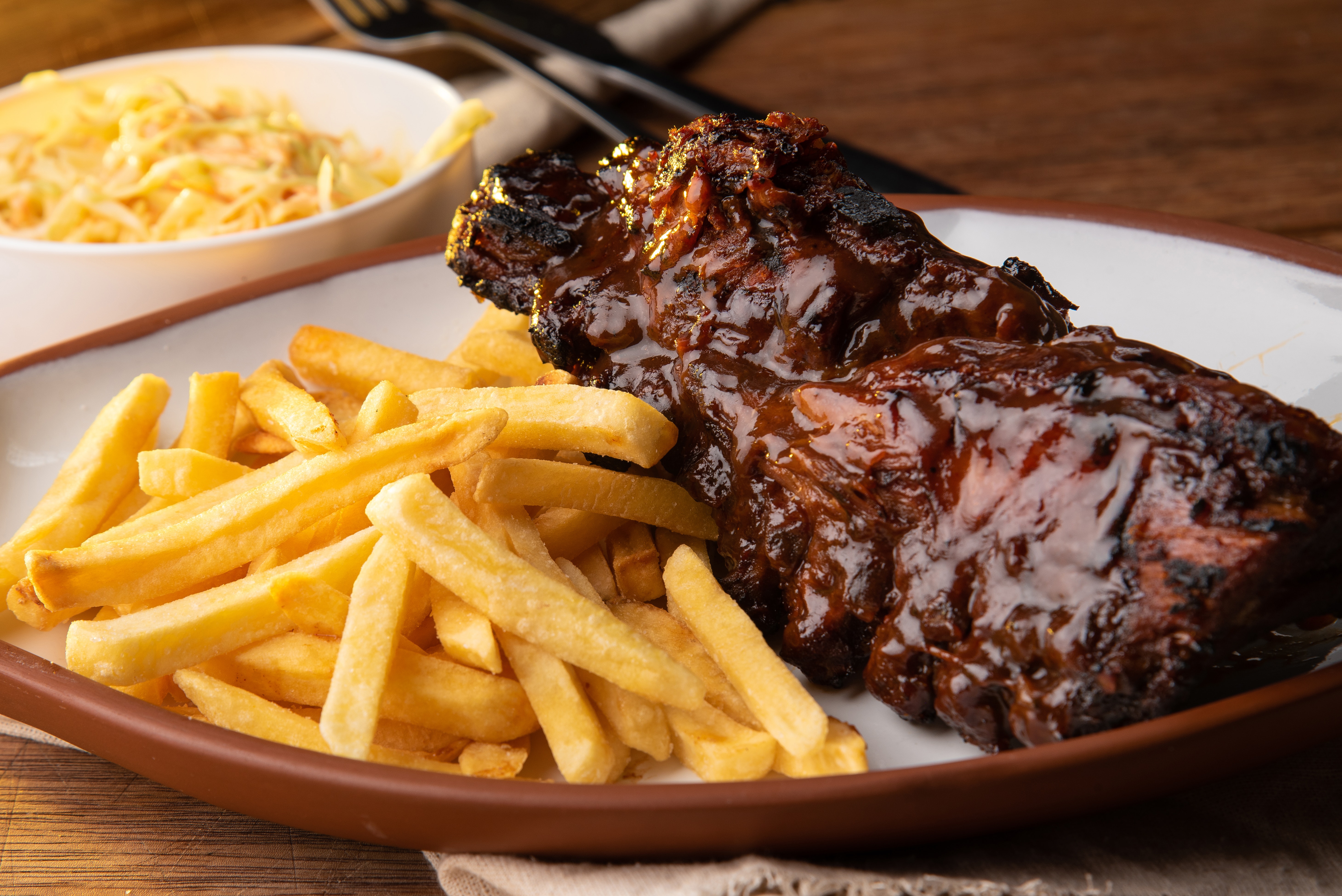 TENDER ANGUS RIBS PREPARED IN BARBECUE